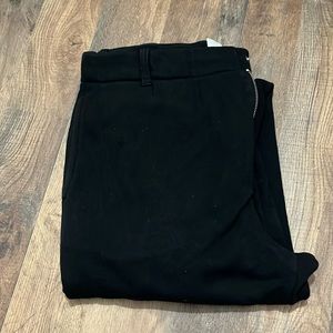 Champion thick sweatpants. They have belt loops, snaps, and a zipper.